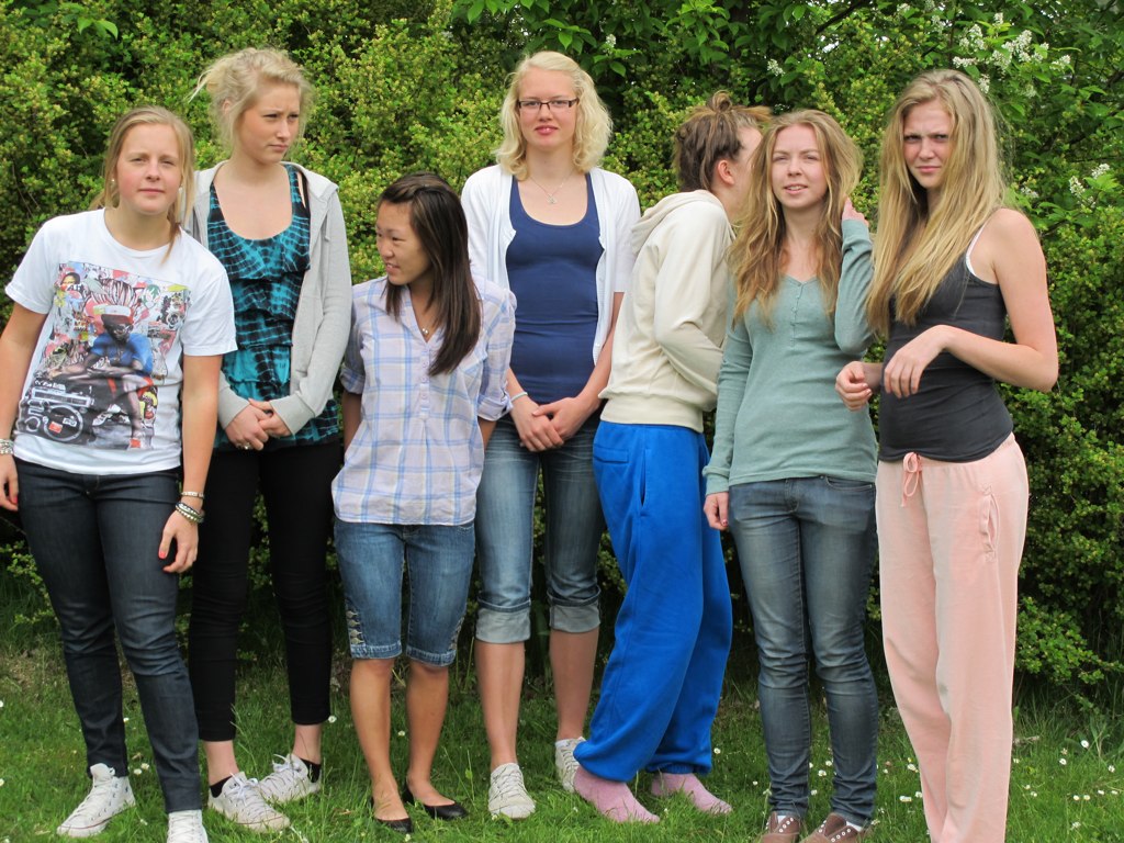 an image of a group of people posing for a picture