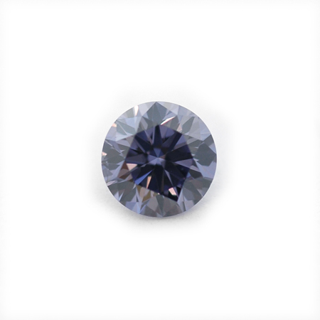 a diamond cut into a diamond with a faceted blue topaz