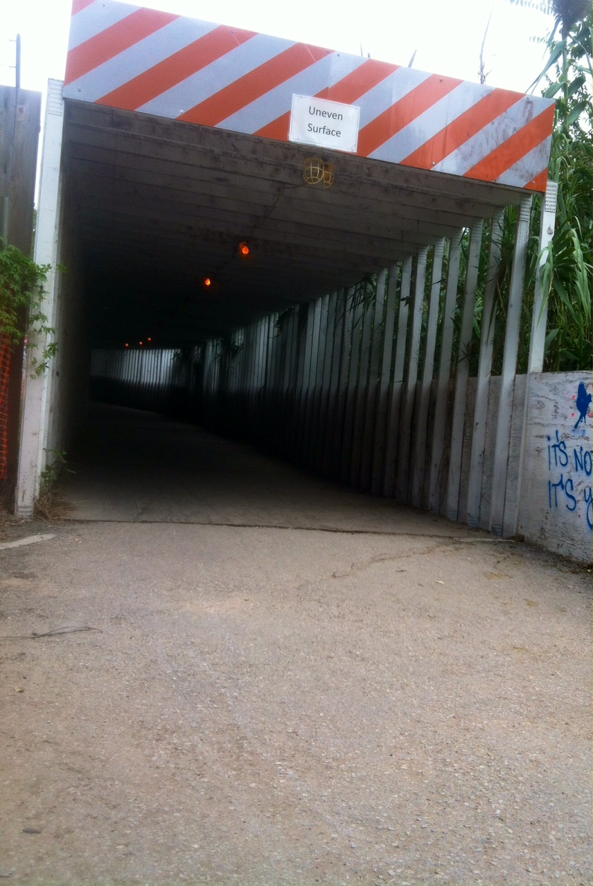 an overpass for cars going under the highway