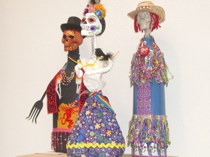 two colorful figurines sitting on top of each other