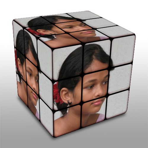 a cube with a couple's faces cut into the sides