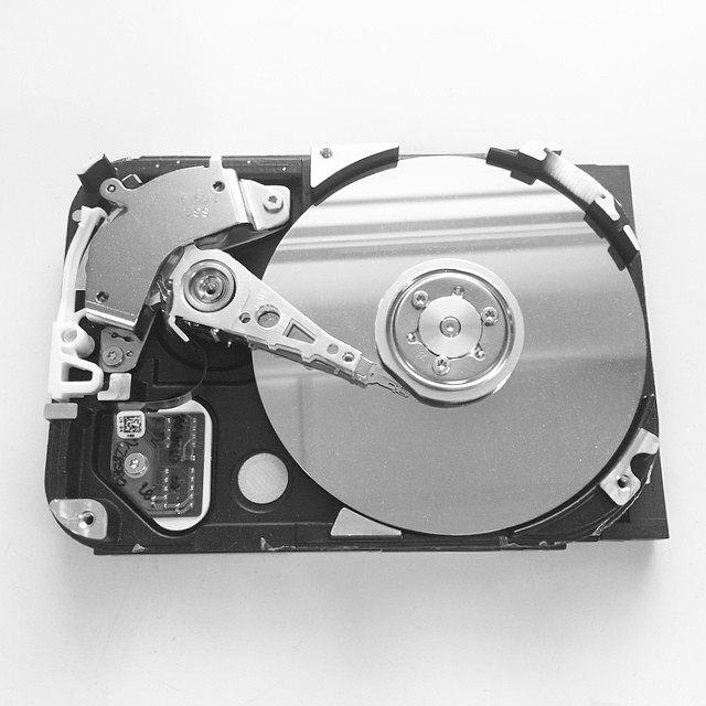 this is a hard drive being held together by a tool