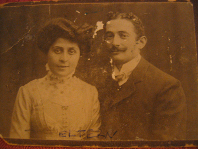 an old fashion picture of a man and woman