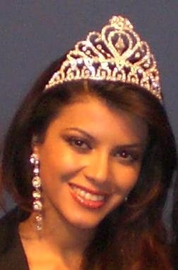 a woman wearing a tiara in an exhibit