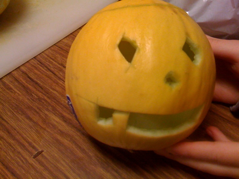 a pumpkin with a smile carved on it