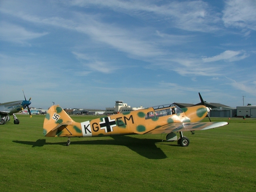 a very colorful plane with letters on it