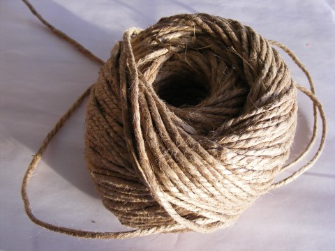 a roll of hemp cord with some twine