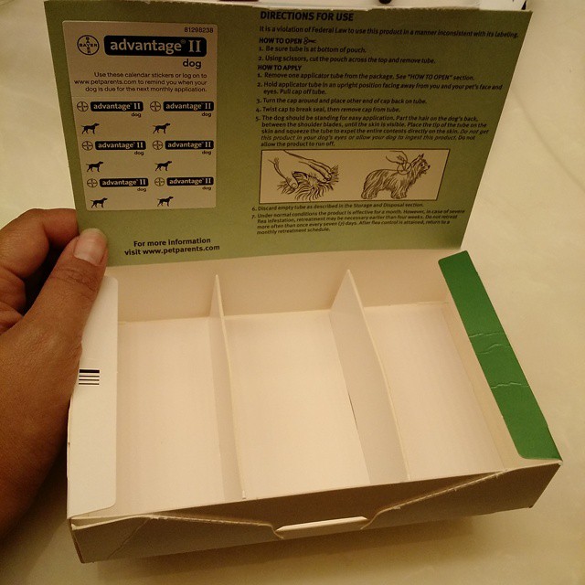 an open box with several different types of objects inside
