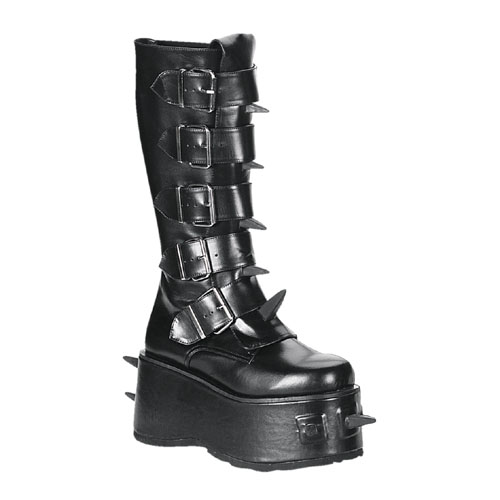 a women's black boot with spikes