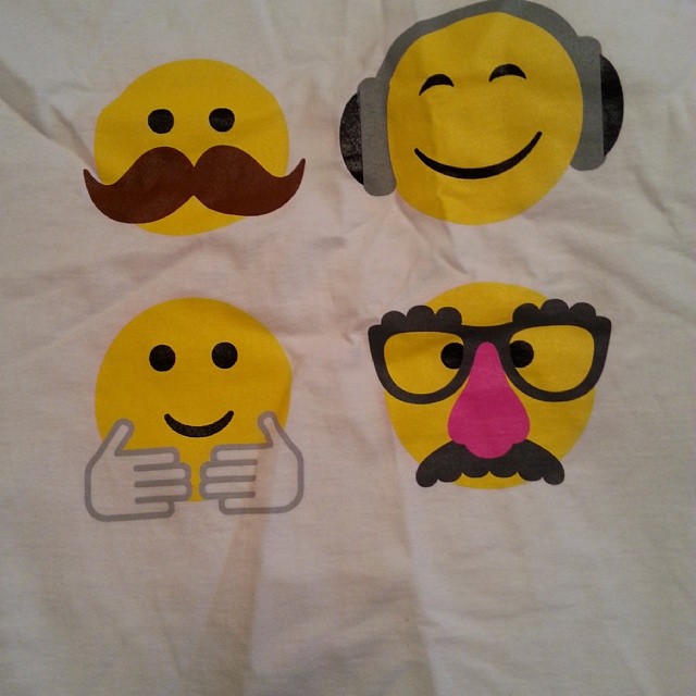 different smiley face images with headphones on and pointing up