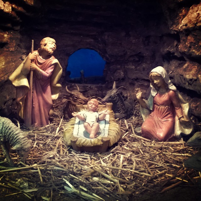 a fake nativity scene depicting three st josephs and a baby jesus