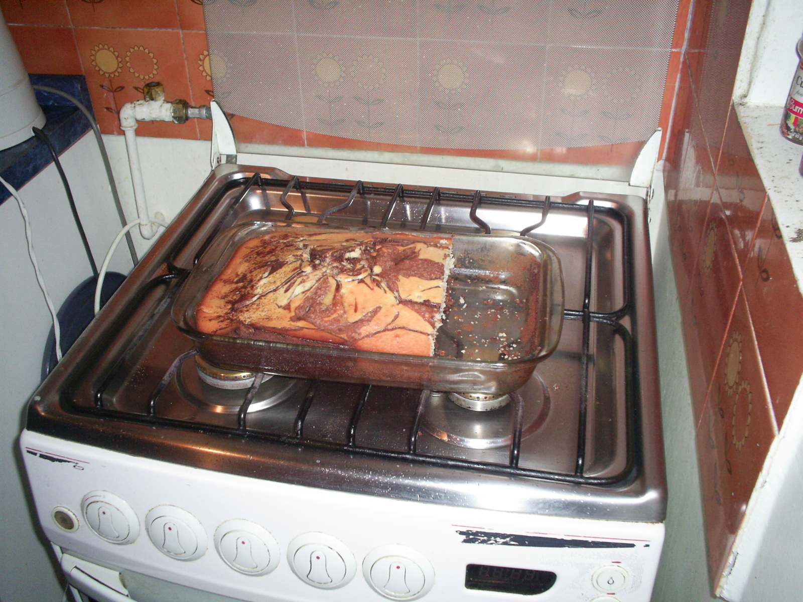 a casserole is cooking in an oven with its lid closed