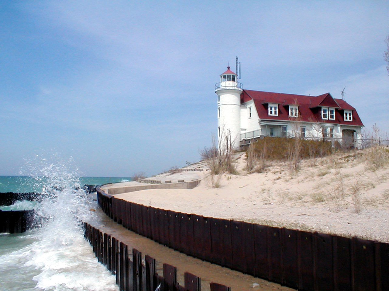 this is an old lighthouse by the beach