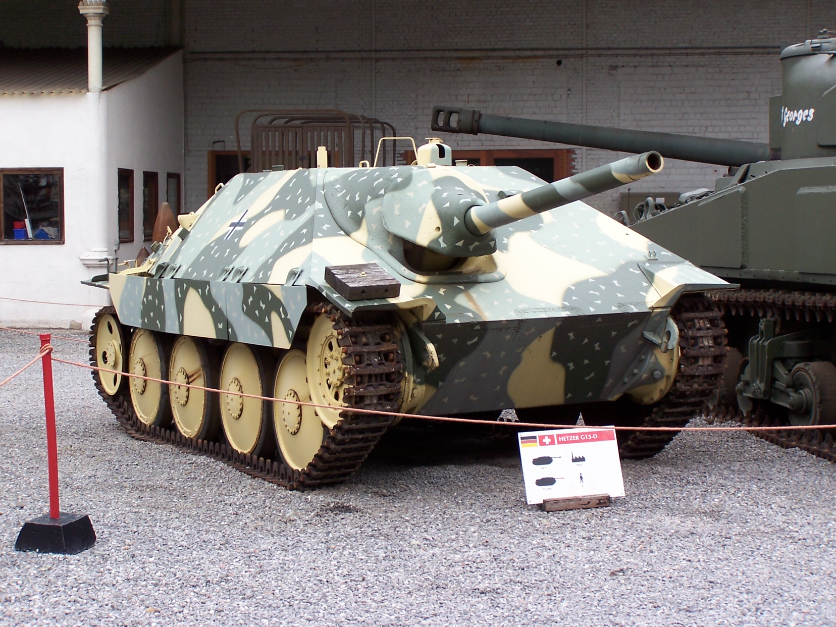 an army tank that is on display outside