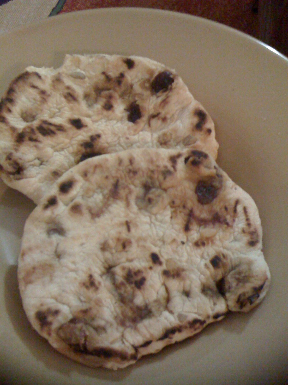 two slices of pita bread on a plate