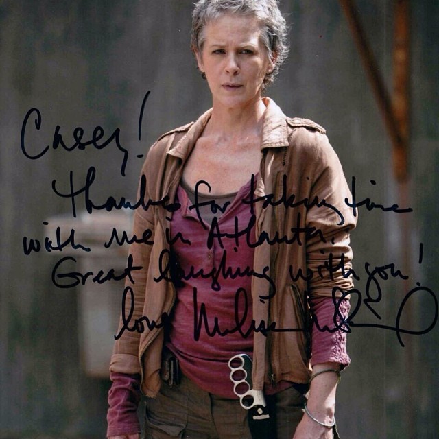 an autographed po of actress rose byrne from the walking dead