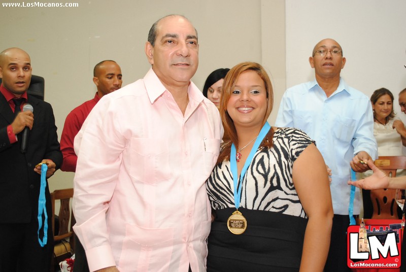 a man and woman stand next to each other