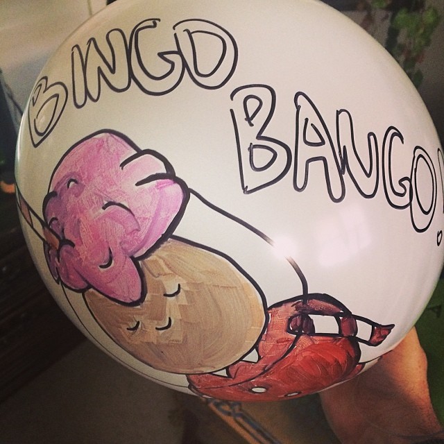 a balloon with a drawing of a donut and a large bagel