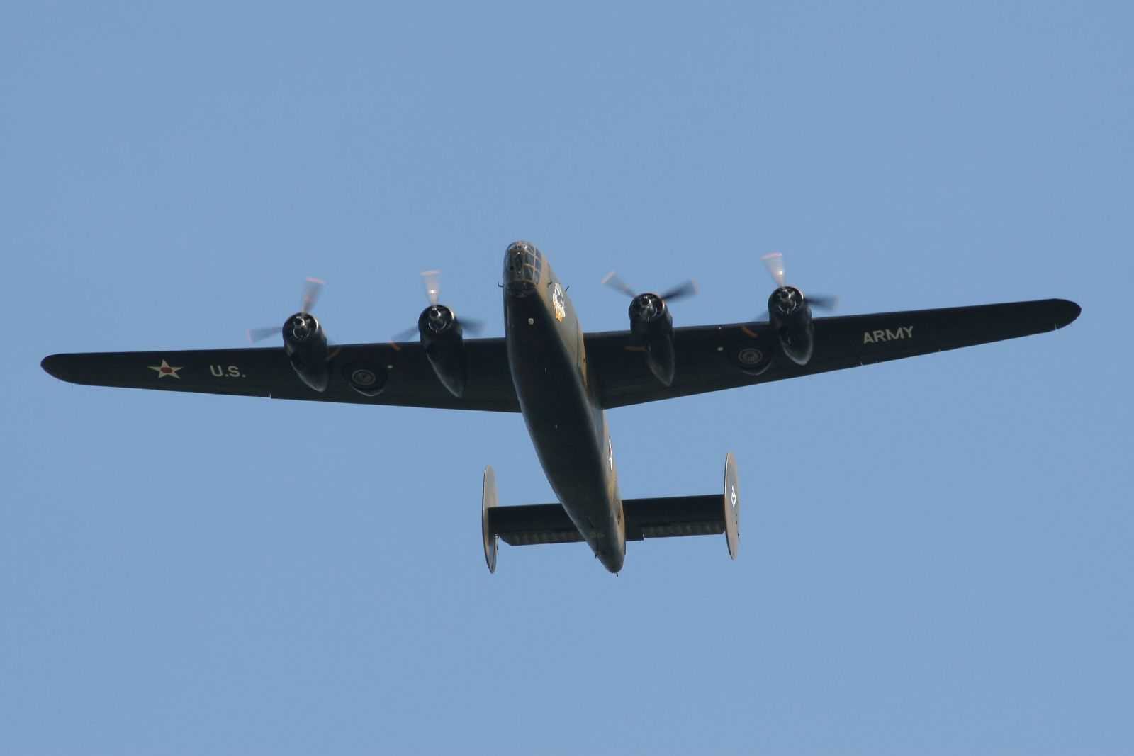 the small plane has propellers that are pointed at the sky