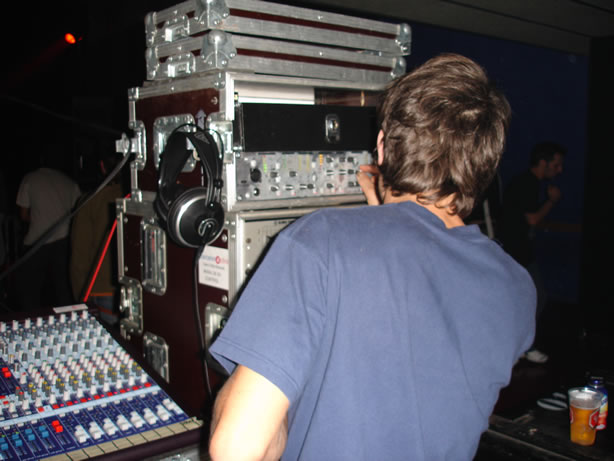 a person is in front of a mixer