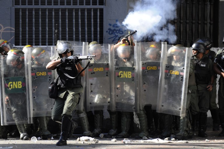 soldiers in riot gear with gun and bullet guns