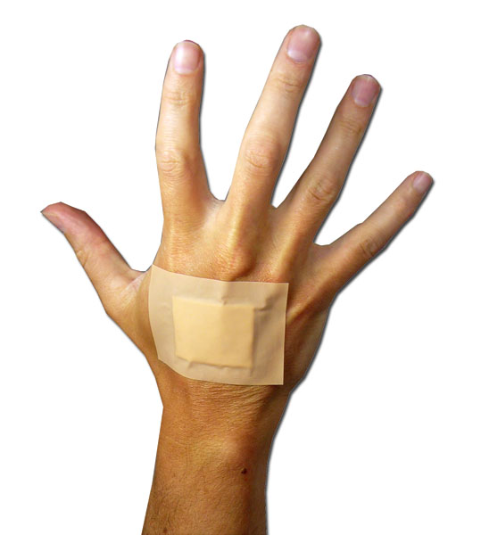 a hand with a bandage around it and a bandage on the thumb