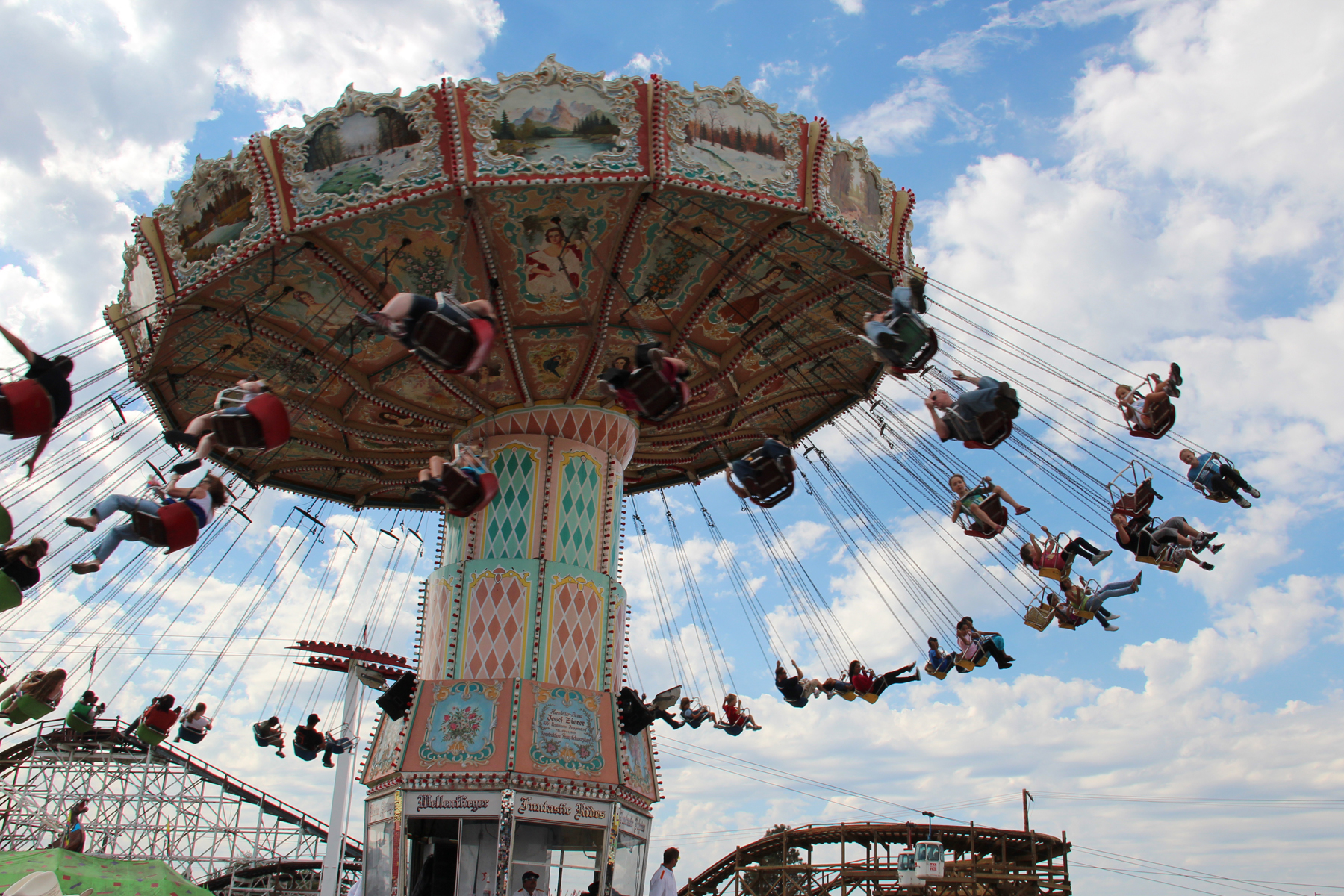 s on a carnival ride that is being amut rides