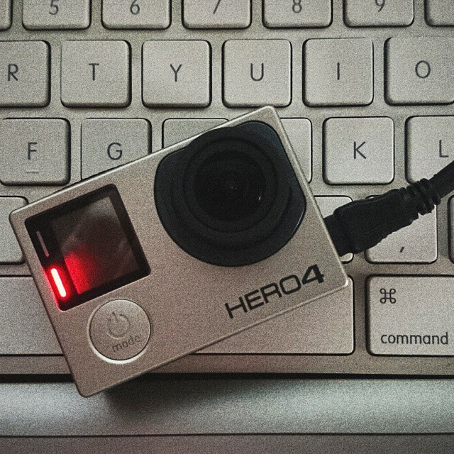 a camera sitting on top of a keyboard
