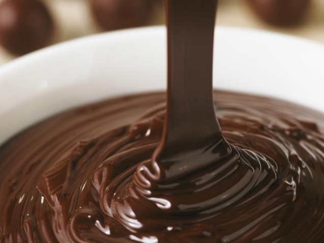 a chocolate liquid pours into a bowl