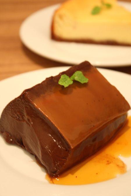 two white plates that have deserts on them