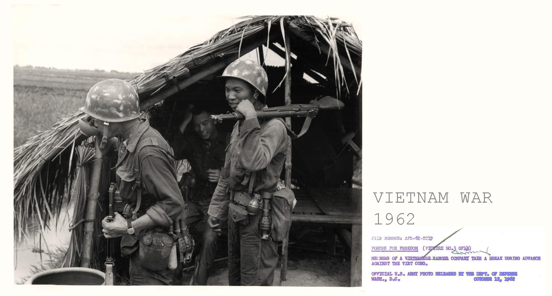 two military men stand next to each other