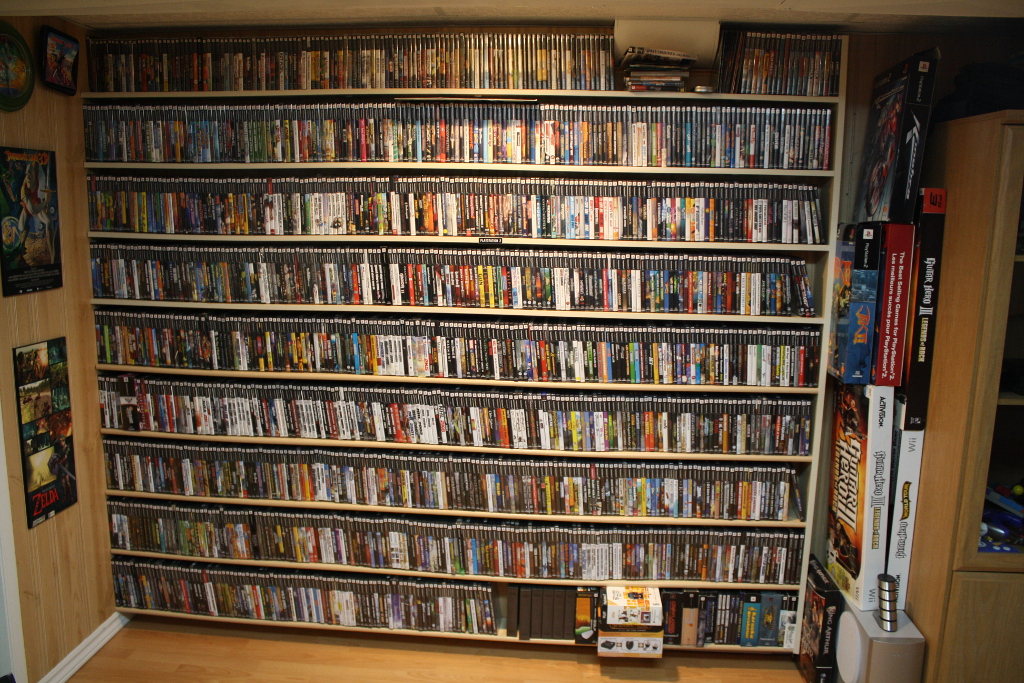 the interior of a home has several games and video consoles