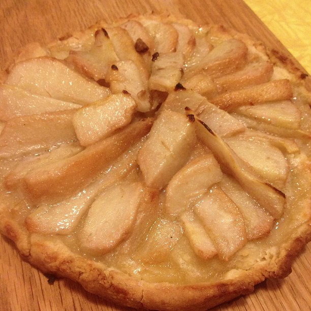 a pie has been sliced into slices and sits on a table