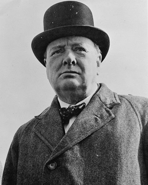 black and white pograph of an older man with top hat