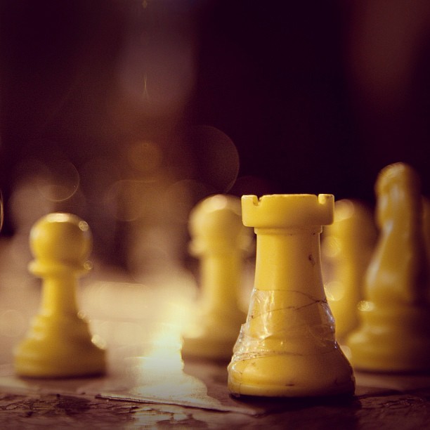 a chess set up on the table for play
