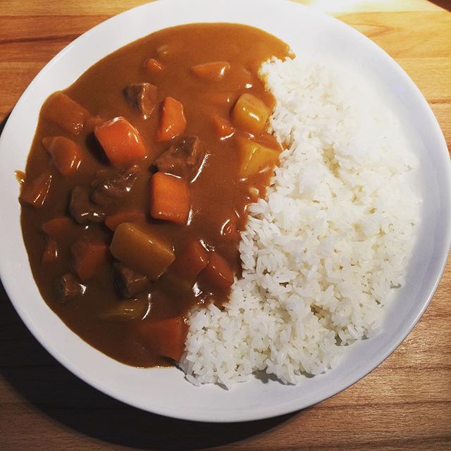 rice and vegetable on plate with other food items