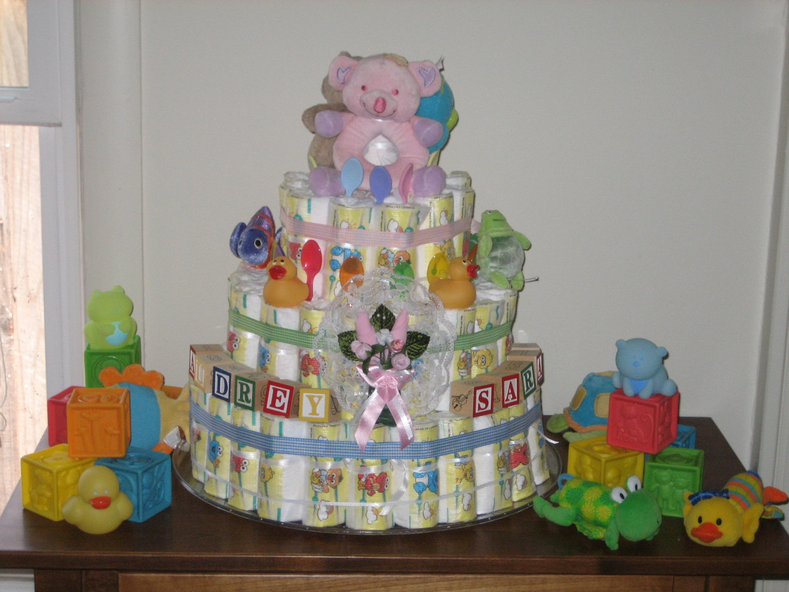 an assortment of baby diapers are arranged in stacks