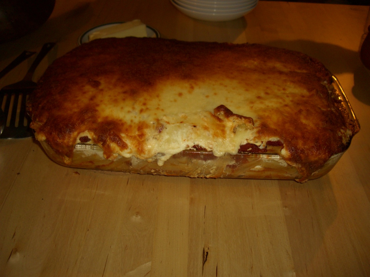 a large casserole in a dish sits on a table