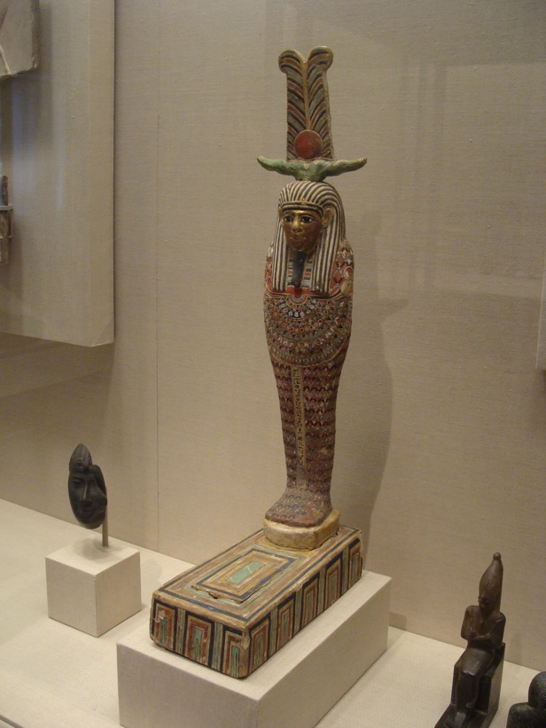 an egyptian themed statue in an art museum