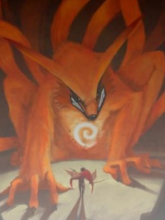 a man standing in front of a giant orange creature