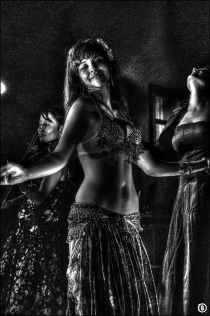 black and white pograph of woman in belly dance