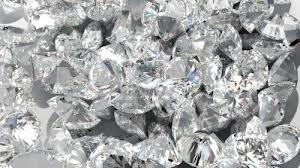 a cluster of diamond pieces sitting in front of each other