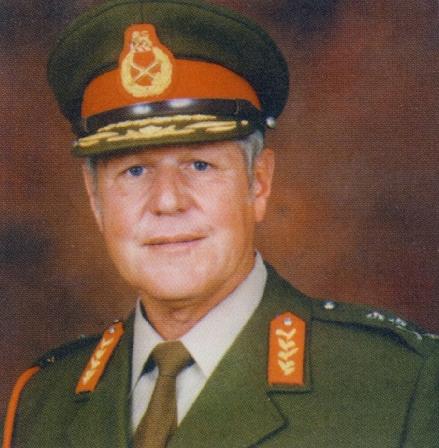 a man in a military uniform posing for a po