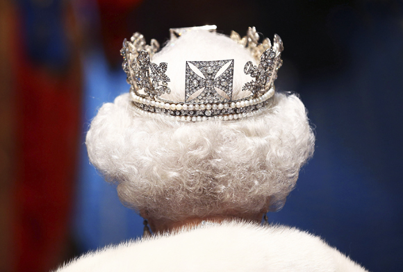 a white haired queen with silver crown on her head