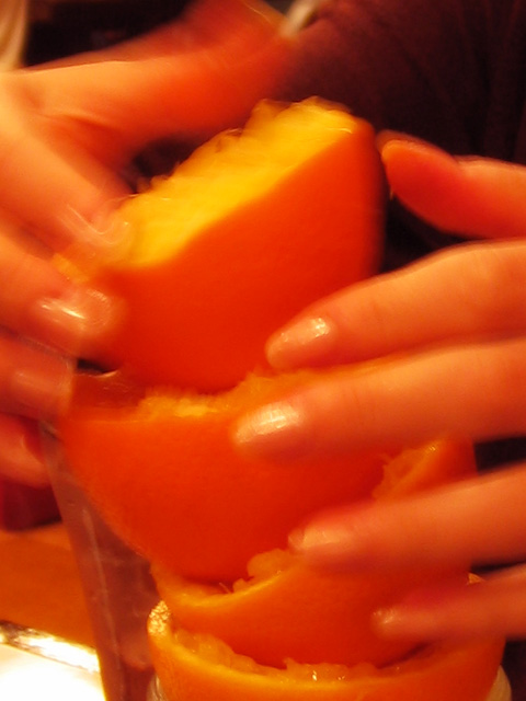 closeup of person  up orange on counter top