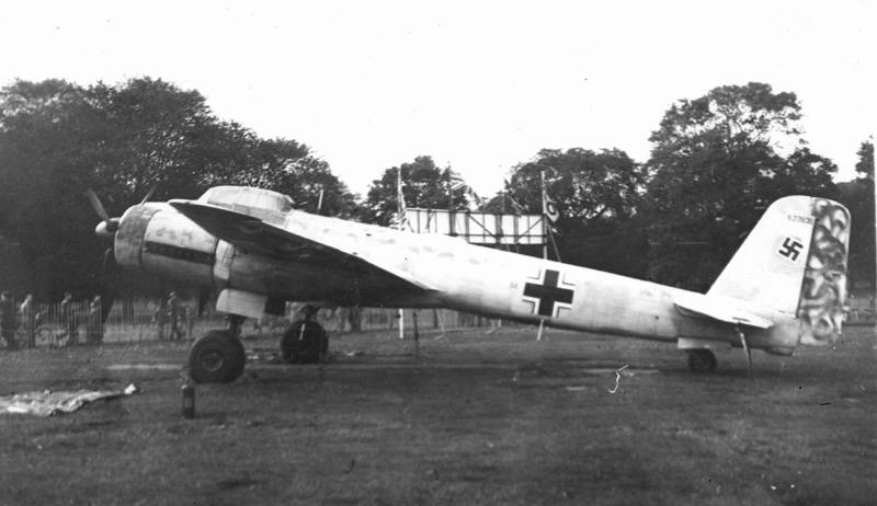 a black and white pograph of an old fighter plane