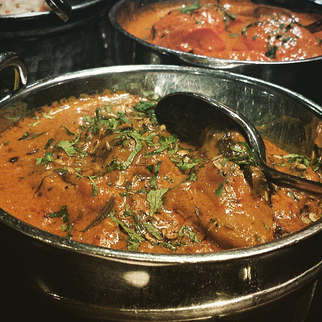 three pots of different types of indian cuisine