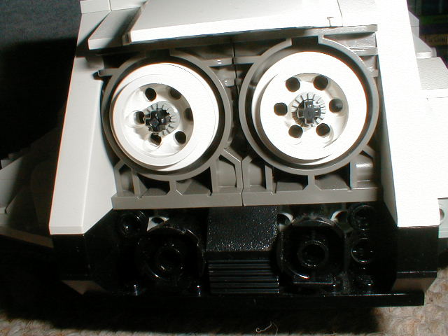 an older lego machine with two wheel disks