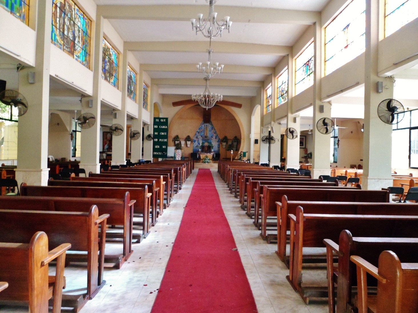 the interior of a church with high ceilings