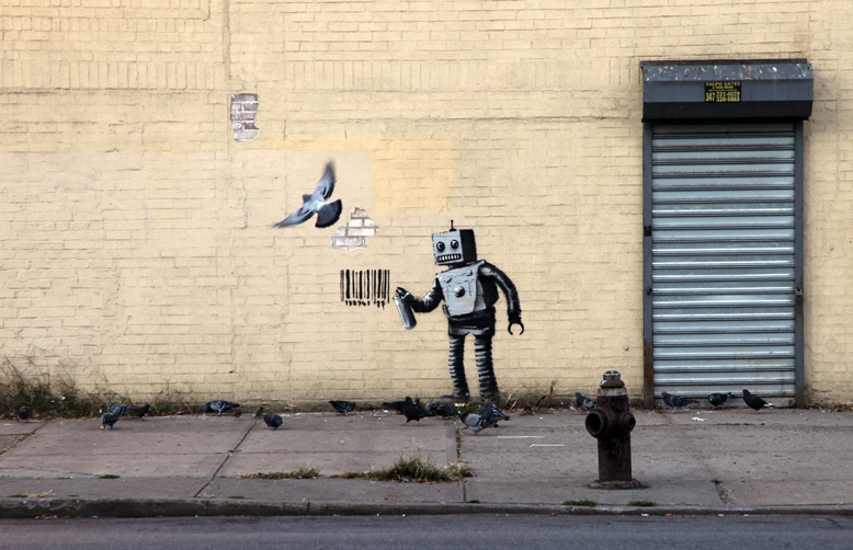 a street scene with a bird graffiti on the wall